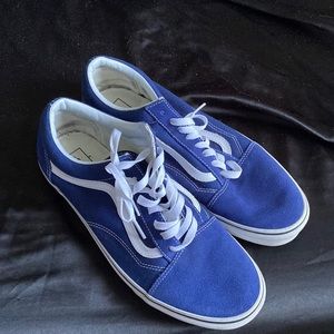 Blue and white low tops vans